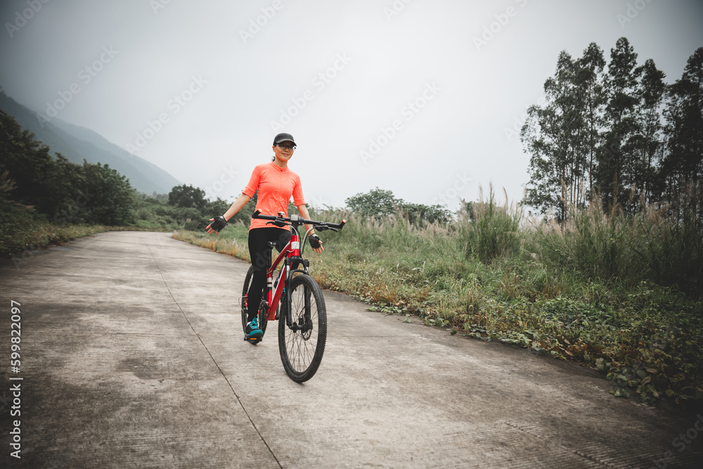 Riding bike in spring forest Riding bike in spring forest