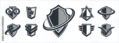 Classic shields shapes set with different additional elements vector symbols set, defense and safety icons, ammo emblems collection.