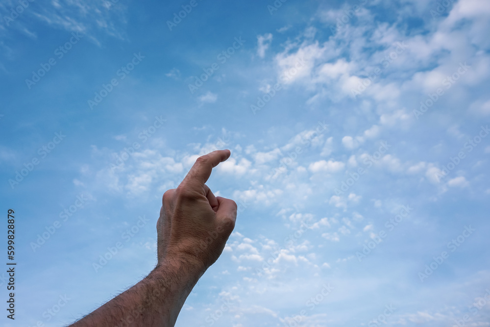 hand up gesturing in the blue sky, feelings and emotions hand up gesturing in the blue sky, feelings and emotions