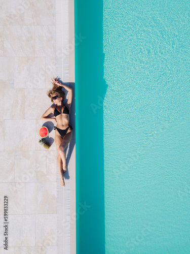 Zenith aerial view of a swimming pool in summer
