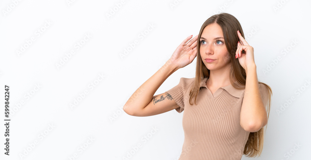 Young Lithuanian woman isolated on white background having doubts and thinking Young Lithuanian woman isolated on white background having doubts and thinking