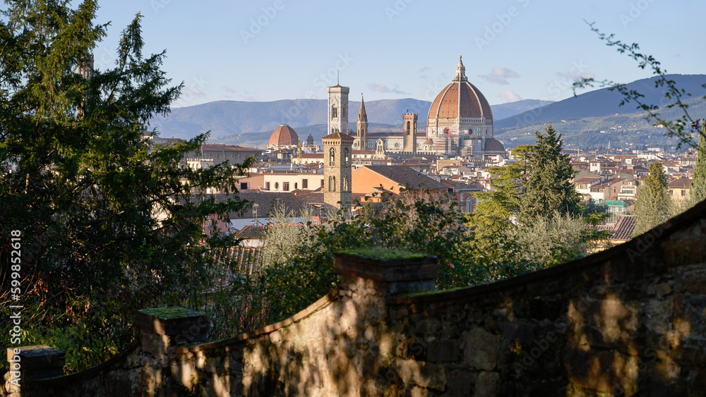 View of the old city of Florence from Giardino delle Rose on a sunny evening