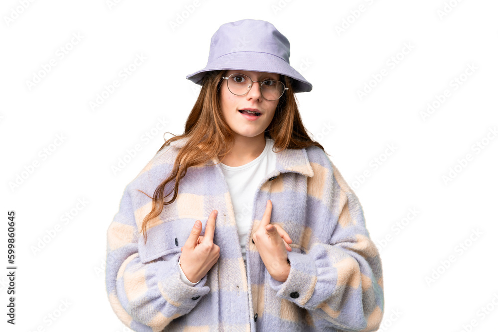 Teenager girl over isolated chroma key background with surprise facial expression Teenager girl over isolated chroma key background with surprise facial expression