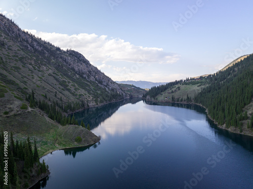 Evening sky over Lower Kolsay Lake in early spring. North Tian Shan, Kazakhstan.