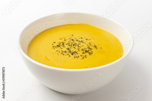 Sweet pumpkin soup on a white background