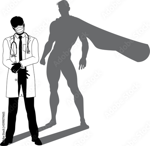 A superhero medical doctor man health care worker revealed by his shadow silhouette as a super hero in a cape.