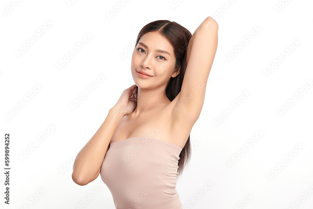Beautiful Young Asian woman lifting hands up to show off clean and hygienic armpits or underarms on white background, Smooth armpit cleanliness and protection concept Beautiful Young Asian woman lifting hands up to show off clean and hygienic armpits or underarms on white background, Smooth armpit cleanliness and protection concept