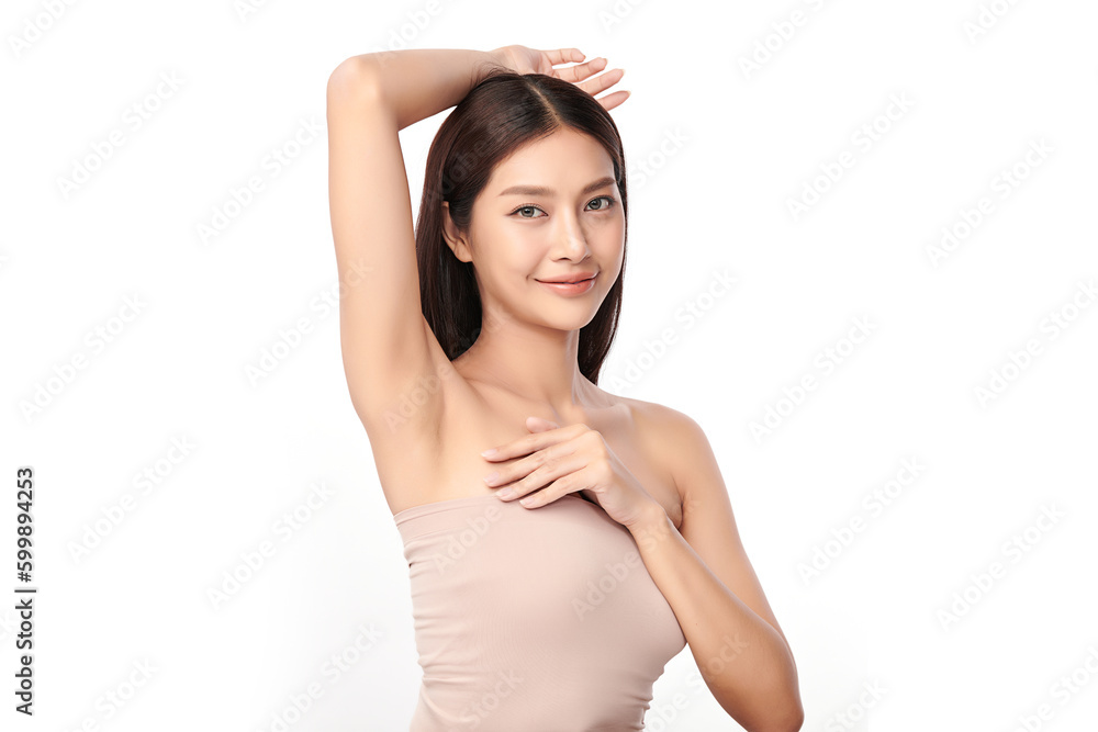 Beautiful Young Asian woman lifting hands up to show off clean and hygienic armpits or underarms on white background, Smooth armpit cleanliness and protection concept Beautiful Young Asian woman lifting hands up to show off clean and hygienic armpits or underarms on white background, Smooth armpit cleanliness and protection concept