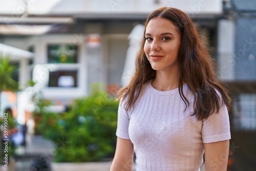 Free Download Young woman smiling confident standing at street - GFXLoad