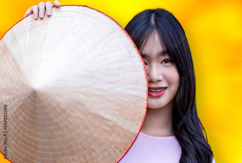 Portrait Happy Smiling Vietnamese Girl In Traditional Vietnamese Ao Dai