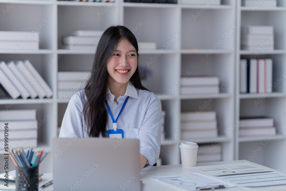 Young happy businesswoman working with tablet in office. Young happy businesswoman working with tablet in office.