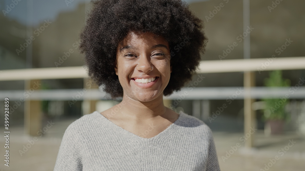 Fototapeta premium African american woman smiling confident standing at street