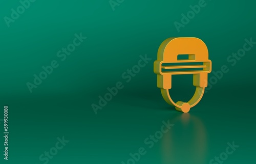 Photography Orange Hockey helmet icon isolated on green background