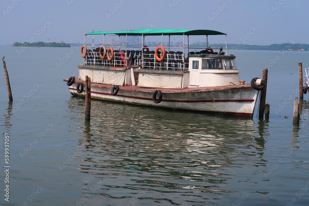 old boat in backwater Kochi