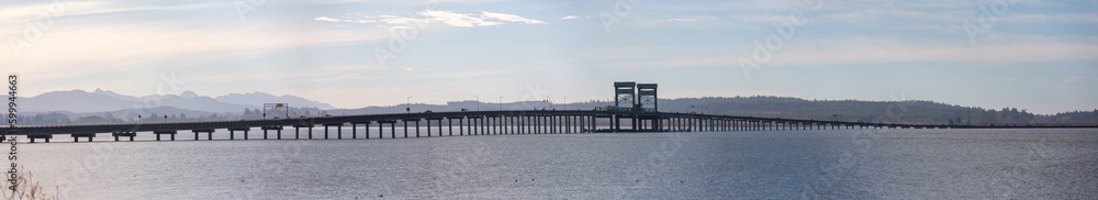 Astoria, Oregon, USA - November 23, 2022: View of bridge over Youngs Bay/Columbia River connectiong Astoria and Warrenton, Oregon Astoria, Oregon, USA - November 23, 2022: View of bridge over Youngs Bay/Columbia River connectiong Astoria and Warrenton, Oregon