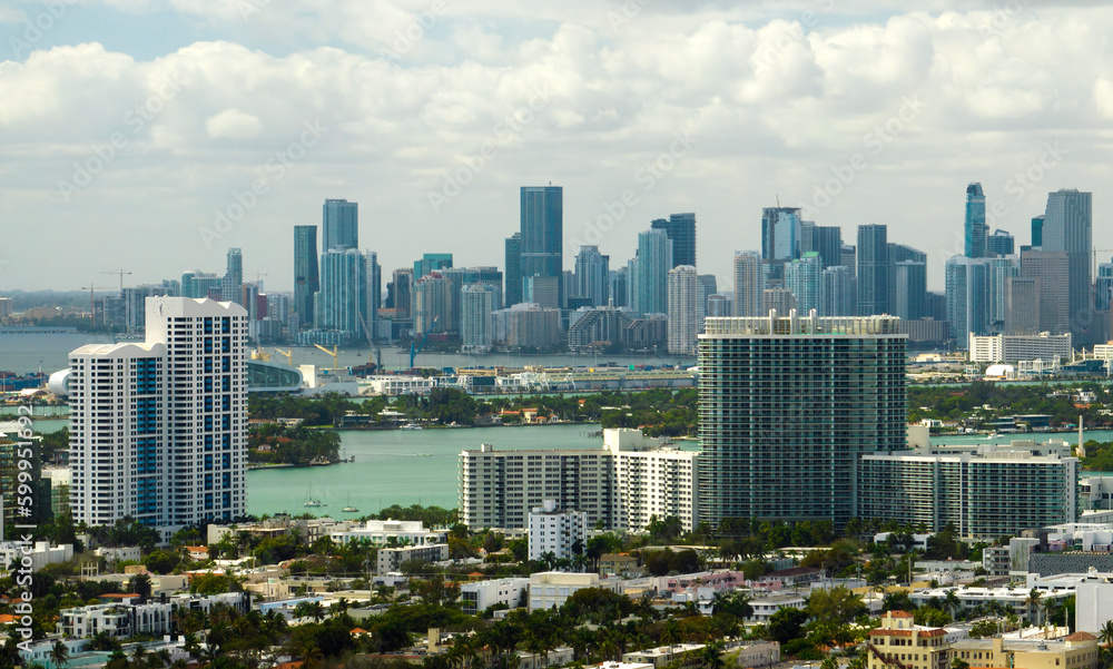 Fototapeta premium Urban landscape of downtown district of Miami city in Florida, USA. Skyline with high skyscraper buildings in modern american megapolis