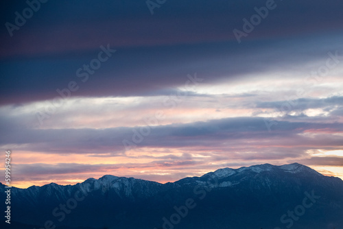 Sunset over the snow covered mountains © CLShebley