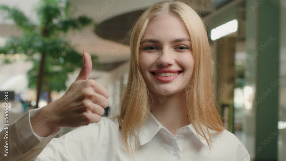 Portrait satisfied customer girl smiling showing thumb up like gesture good result happy Caucasian woman businesswoman shop assistant approve idea recommend discount on black friday in shopping mall Portrait satisfied customer girl smiling showing thumb up like gesture good result happy Caucasian woman businesswoman shop assistant approve idea recommend discount on black friday in shopping mall