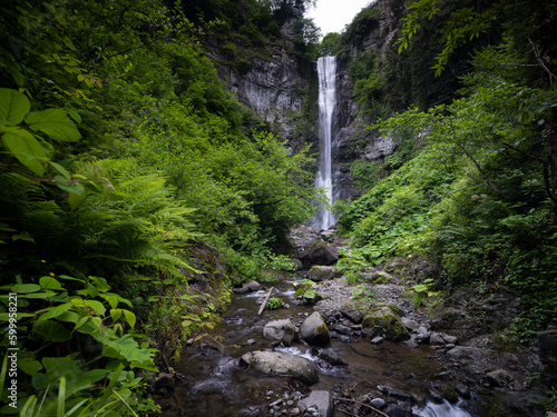 Beautiful waterfall cascade on forest. Maral waterfall in summer season. Eastern black sea forests Karcal mountains. Maralkoy, Borcka district, Artvin city, Turkey photo