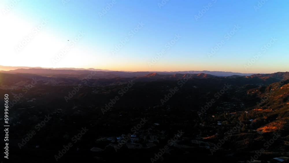 Aerial Panning Shot Of Mountain Ranges Against Sky During Sunset, Drone Flying Over Landscape - Malibu, California Aerial Panning Shot Of Mountain Ranges Against Sky During Sunset, Drone Flying Over Landscape - Malibu, California