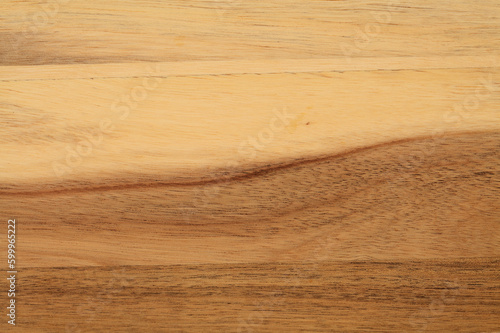 Mango tree wood texture with rings of different colors closeup, natural background