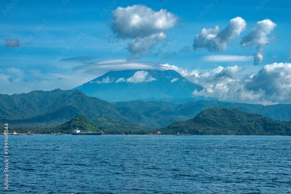 Views of the north coast of the Island of Bali with Mount Agung (Gunung Agung) volcano in the background, Bali, Indonesia Views of the north coast of the Island of Bali with Mount Agung (Gunung Agung) volcano in the background, Bali, Indonesia