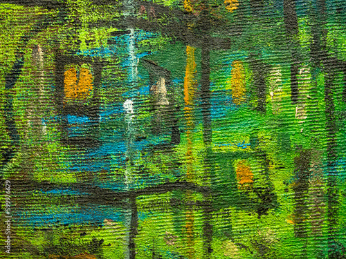 Colorful surface of the painting. Texture of painting. Painting artwork facture. Colorful texture. Abstract background. Oil painting on canvas with green, yellow, black and blue colors. 