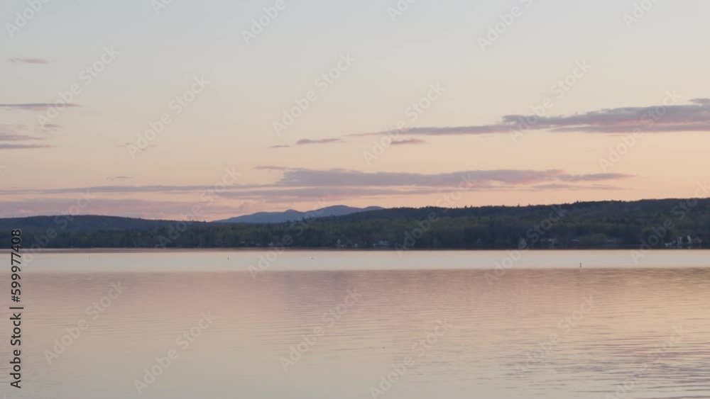 memphremagog lake in quebec canada magog time lapse water mountain sunset panoramic panning memphremagog lake in quebec canada magog time lapse water mountain sunset panoramic panning