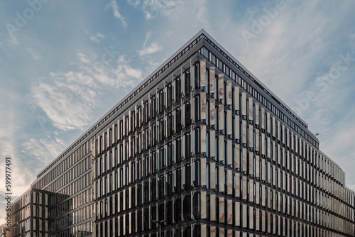 Fotografie Outdoor exterior view of office building covered with marble vertical louver panels along Benrather street along downtown Düsseldorf, Germany