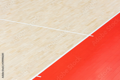 Wooden floor volleyball, basketball, badminton, futsal, handball court. Wooden floor of sports hall with marking lines line on wooden floor indoor, gym court