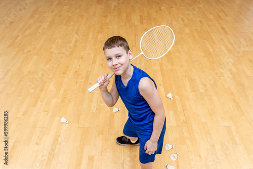 Kid playing badminton. Horizontal sport theme poster, greeting cards, headers, website and app