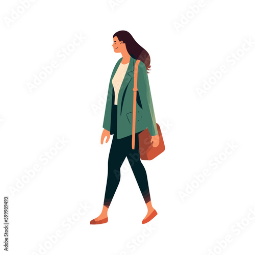 Smiling woman carrying shopping bag in fashion district