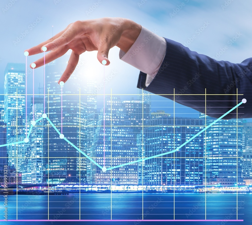 Businessman controlling the market with strings Businessman controlling the market with strings