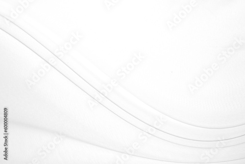 Smooth elegant white silk or satin luxury cloth texture can use as wedding background. Luxurious background design