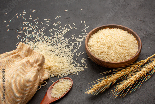 front view raw rice inside bag on a grey background rice raw food east cooking