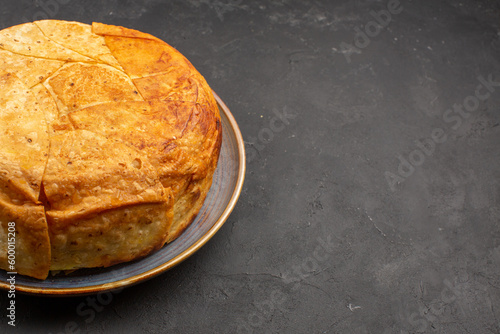 front view tasty shakh plov cooked rice inside round dough on grey background rice meal cooking dough food cuisine photo