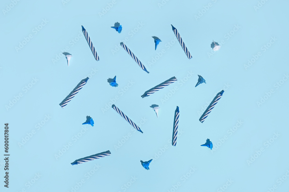 Birthday candles on blue background Birthday candles on blue background