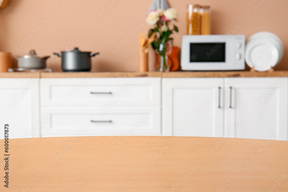 Clean wooden table in kitchen