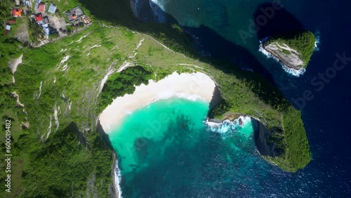 Kelingking beach. Kelingking Beach is the top destiantions on Nusa Penida Island. However visiting Kelingking viewpoint is one of the most famous things to do in Bali.  photo