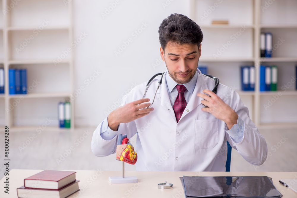 Young male doctor working at the hospital Young male doctor working at the hospital