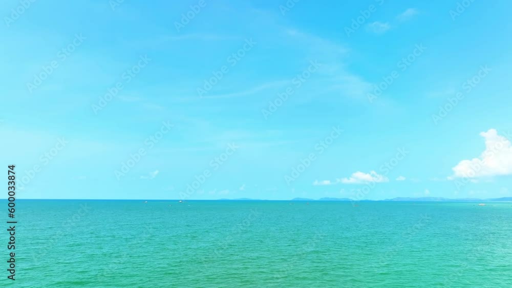 A sleek drone fly over the vast expanse of the deep blue sea and clear blue sky, capturing stunning aerial views of the tranquil waters and endless horizon. Nature concept. Nature background video. 4K A sleek drone fly over the vast expanse of the deep blue sea and clear blue sky, capturing stunning aerial views of the tranquil waters and endless horizon. Nature concept. Nature background video. 4K