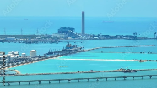 Reclamation is the process of creating new land from the sea. This technique is commonly used in the development of industrial ports, where new land is created to accommodate port facilities. Drone
