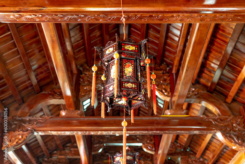Lanterns hanging from the wooden ceiling