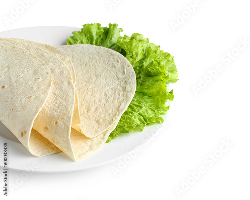 Plate with thin lavash and lettuce on white background