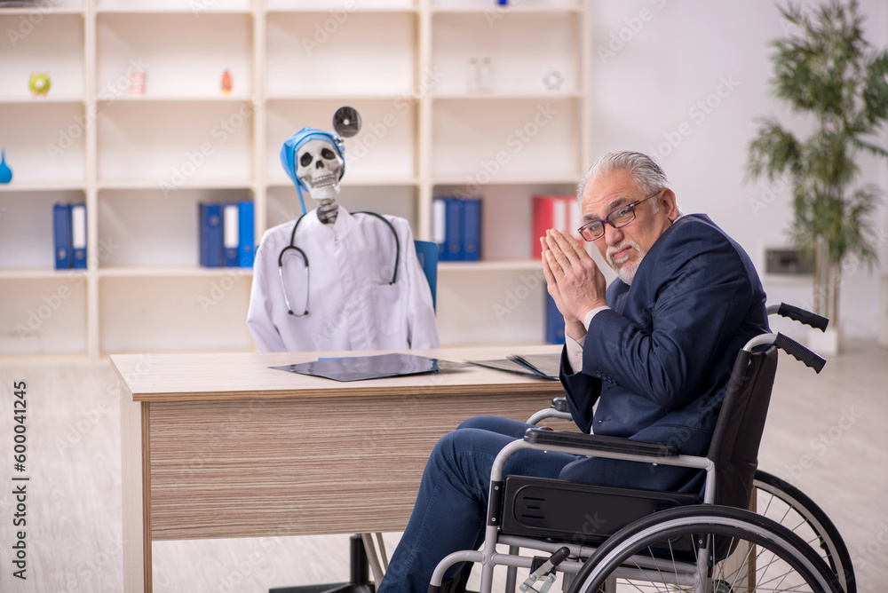 Old patient in wheel-chair visiting devil doctor Old patient in wheel-chair visiting devil doctor