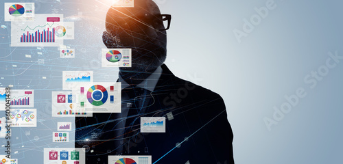 Executive man and data technology concept. Wide angle visual for banners or advertisements.