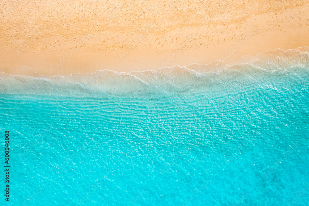 Relaxing sand waves aerial beach, summer vacation tropical Mediterranean landscape banner. Amazing blue ocean lagoon, sea shore coastline. Beautiful aerial drone top view. Peaceful beach, seaside surf