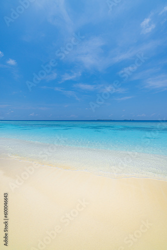 Tranquil landscape closeup of sand on exotic beach. Panoramic beach landscape. Idyllic tropical beach and seascape. Sunny blue cloudy sky, soft sand, calmness, tranquil relaxing sunlight, summer mood © icemanphotos