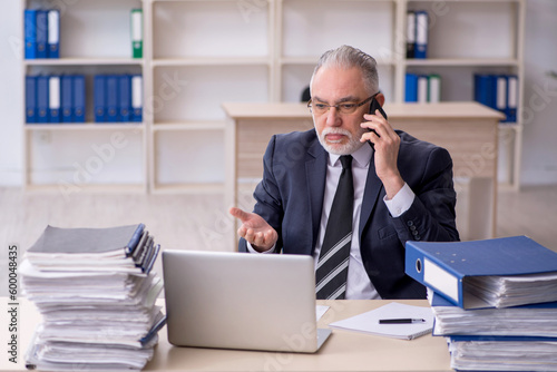 Old male employee and too much work at workplace