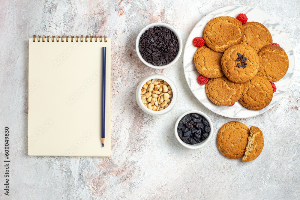 top view yummy sugar cookies from sand dough with nuts on a white background biscuit sugar cookie sweet cake tea top view yummy sugar cookies from sand dough with nuts on a white background biscuit sugar cookie sweet cake tea